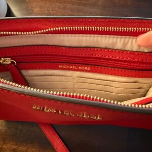 Michael Kors Red crossbody with built in wallet features